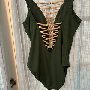 Gently worn shape control hunter green swimsuit.